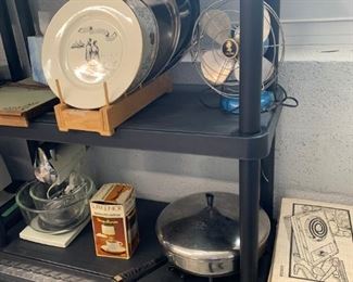 decorative plates, old fan, mixer, skillet