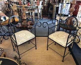 Unusual pair of wrought iron armchairs