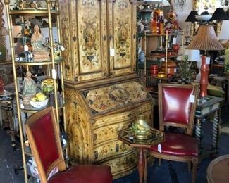 19th Century painted secretaire (former prop from 20th Century Fox Studios), pair of red leather side chairs.