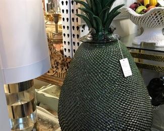 Oversized glazed terracotta pineapple.