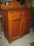 ANTIQUE JELLY CABINET , TWO DRAWERS OVER TWO DOORS, WITH A BACK GALLEY , SOFT WOOD, MEASURES 42 INCHES TALL, 42X18