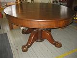 ANTIQUE ROUND PEDESTAL TABLE, MAHOGANY WOOD, WITH A 5 INCH BALL AND CLAW TALON CARVED FOOT. FOUR CLAWS , WITH PADDED COVERS 30