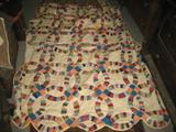 HAND MADE VINTAGE QUILT WITH COLORED RINGS, SCALLOPED EDGE , 92X70 INCHES