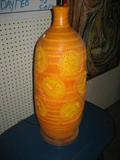 LARGE MODERN ORANGE LAMP, CIRCA 1970'S POTTERY LAMP , THE POTTERY PART IS 27 INCHES TALL WITH THE FINIAL IS 38 INCHES TALL