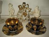 THREE FIGURATIVE PORCELAIN ITEMS, AND TWO GOLD AND COBALT BLUE CUPS AND SAUCERS MARKED MADE IN GERMANY