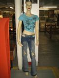 LADY MANIQUIN , SHE IS 5 FOOT 10 INCHES TALL, WITH JEANS AND T SHIRT