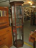CURIO CABINET, GLASS SHELVES, MIRROR BACK, 71 INCHES TALL, AND 19 INCHES WIDE