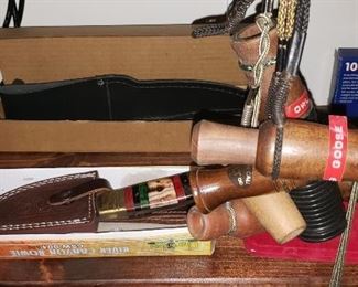 Assortment of Hunting Knives and Duck Calls