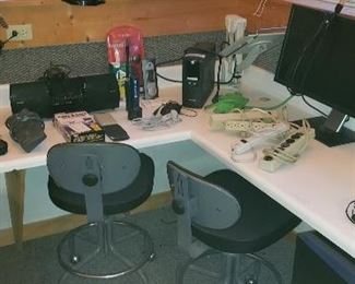 Many different office supplies and office & drafting chairs