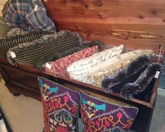 Cedar chest; decorative pillows