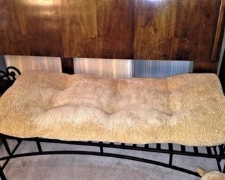 Black metal bed bench with cushion