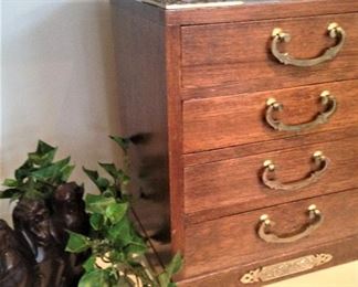 Small wooden chest with drawers