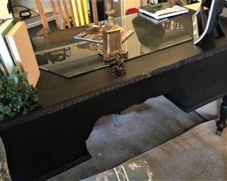 Back side of black desk