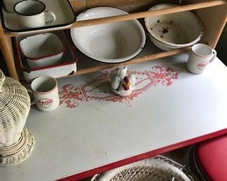 Enamel top table w/red edge & center design