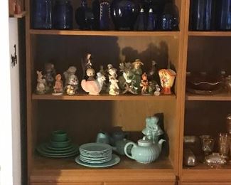 Cobalt blue glass, figurines, and one of the many sets of china