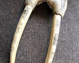 Hand carved antique walrus tooth