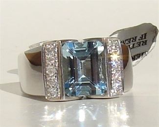 Lot 145 - Ladies 14K White Gold Large Blue Topaz and Diamond Ring Size 8.5
