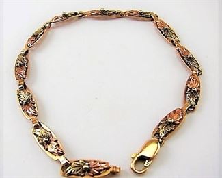 Lot 169 - Ladies Gold 14K, 10K, Sterling Leaf Chain Bracelet
