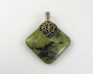 LOT 289: Ladies Sterling Silver and Green Stone Pendant
