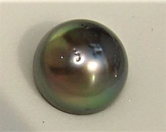 LOT 280: Two Large Black South Sea Pearls - Peacock 12 mm each Loose in gem box
