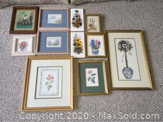An assortment of framed prints
