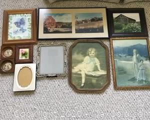 An assortment of framed prints