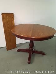 Beautiful two toned Round Table With Leaf. Table 