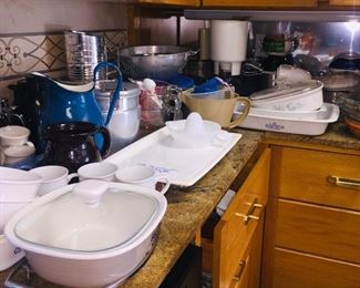 large kitchen filled with cookware