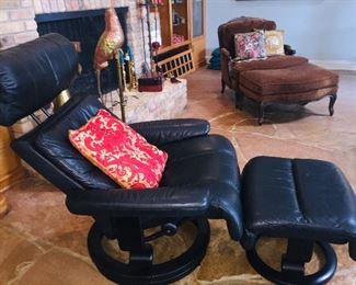 Ekornes chair and ottoman and can you see the large leopard skin chair and ottoman