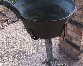 several old time sugar and rendering  pots