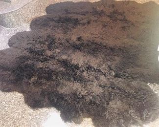 Area sheep skin rug 