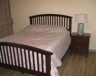 queen bed and nightstand