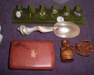 sterling rings, wood netsukes, carved shell spoon, 
