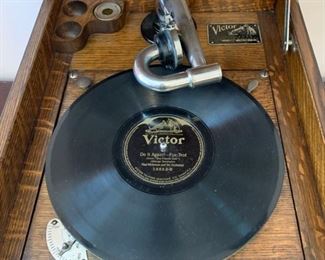 #4	Victor Talking Machine Victrola in tiger oak cabinet made in 1913. Style number VV-VII 19"x15.5"x13" It has a needle, one disc and it works!	 $250.00 	 