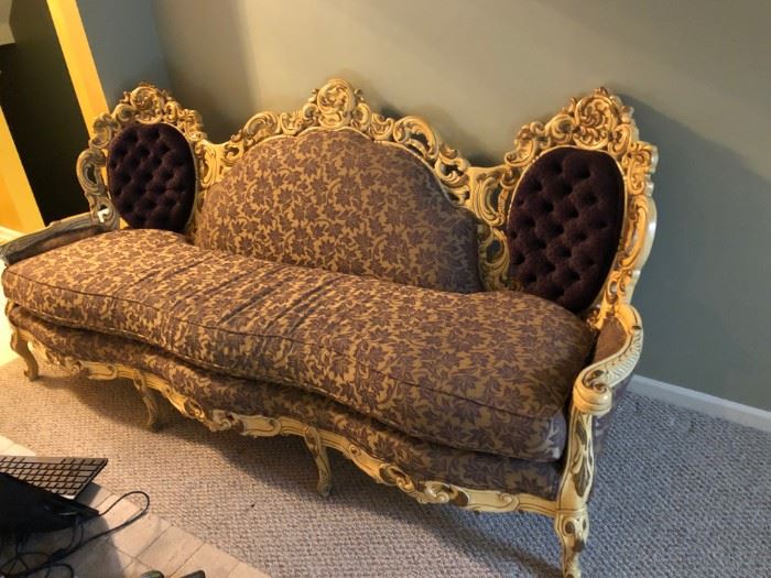 Victorian wood carved sofa 92" inches with a matching chair in the next pic.  This was newly upholstered in the eggplant leaf fabric with plum velvet tufted backs as shown