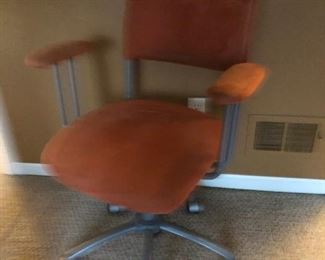 desk chair with burnt orange faux suede fabric 