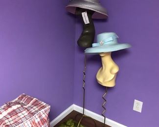 Hat stands with many Ladies Hats available , there are also wig stands available as my client sold these at shows and no longer runs the business