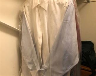 Men's Large dry cleaning dress shirts.  Some of the few items, including Men's Suits 