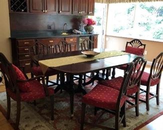 Baker Table and set of 8 chairs.  This is part of my off site sale, call to view