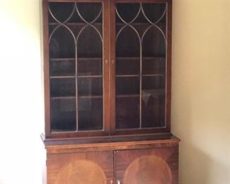 Baker, Milling Road china cabinet 39" w X 16" deep X 82" inches high.  The upper doors are 9.5" inches deep.  This is part of my off site sale, call to view