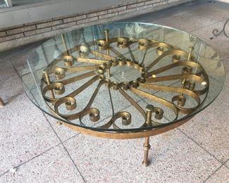 Iron & heavy glass round cocktail table.  This is part of my off site sale, call to view