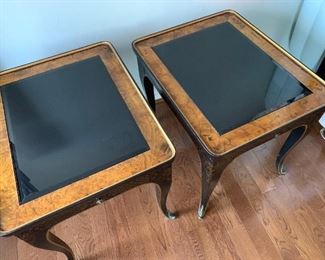 Pair of Henredon side table with black glass and metal tip feet.  There is a matching coffee table too.  This is part of my off site sale, call to view