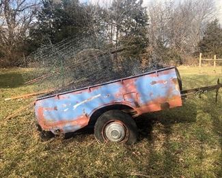 Vintage Datsun truck bed trailer. You will need a trailer to pull this out!