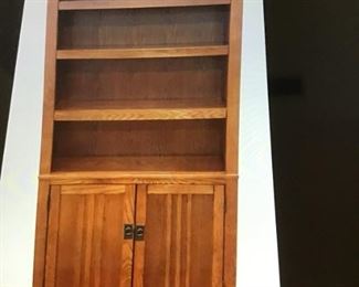 Oak 4 shelf bookshelf with storage beneath