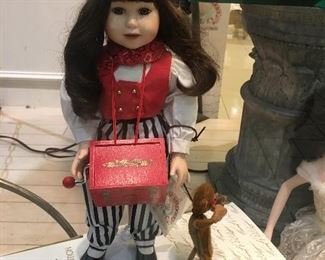 Organ grinder doll