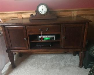Maple buffet table revised for a tv storage unit( DVD’s , headphones, etc.,.)