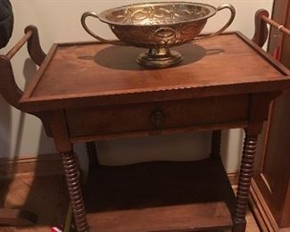Vintage tea cart with side handles and rubber wheels will show off beautifully anywhere.  ( multiple woods)