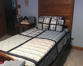 Oak twin bed with great detail on foot board and head board.