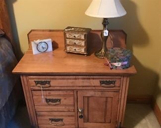 Small maple commode/bedside dresser able to fit in most any room.