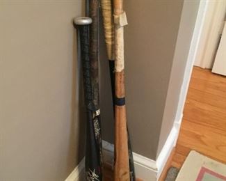 Baseball bats.